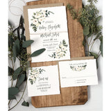 Rustic wedding invitation with soft watercolor florals